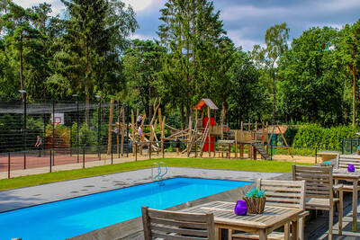 Het buitenbad van Ferienpark De Rimboe en De Woeste Hoogte